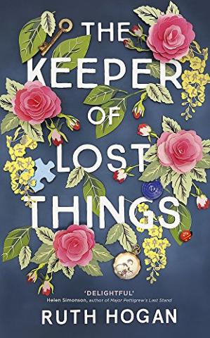 Book Cover for The Keeper of Lost Things by Ruth Hogan. The cover is dark blue with pink roses and green leaves. 