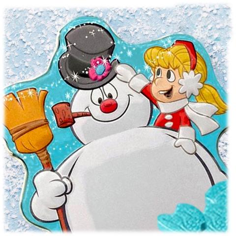 Girl putting a black, top hat on Frosty the Snowman who is smiling, holding a broom and has a pipe in his mouth. 