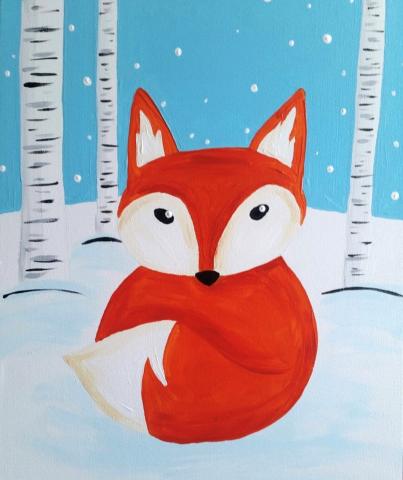 Red fox with white tail and face sitting in the snow and three birch trees in the back. 