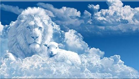 White clouds in blue sky. A lion and a lamb are clouds in the clouds. 