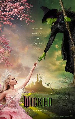 A green witch dressed in black reaching her hand down to touch the hand of a good with dressed in pink. 